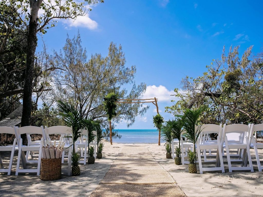 wedding ceremony set up on a beach at Paradise Cove Resort